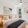 Bedroom with a window and ceiling fan