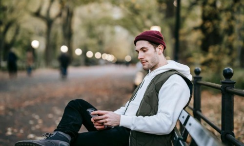 A beautiful community at the heart of all your passions a person sitting on a bench