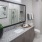 a bathroom with a large mirror