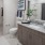 a bathroom with a marble countertop