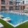 a pool with chairs around it