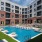 a pool in front of a building
