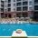 a pool in front of a building